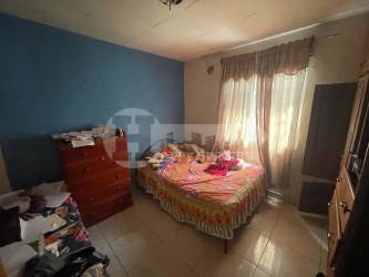 Simple utility kitchen with wooden cabinets Atalaya Panama house for sale