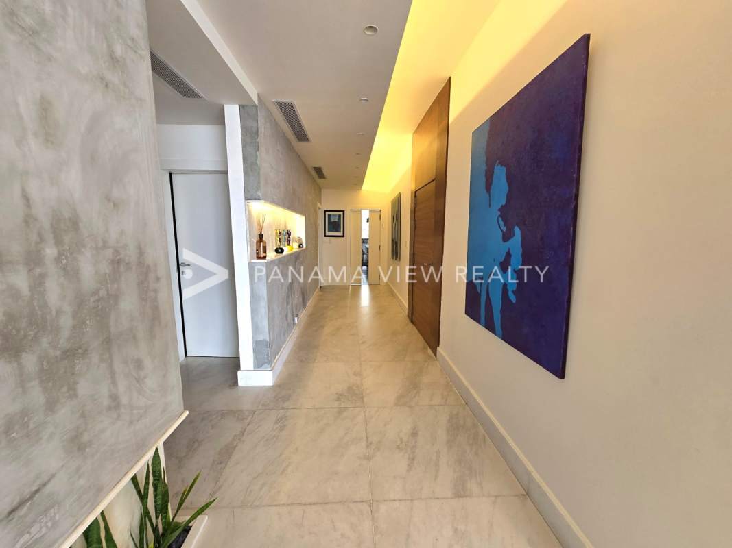 Modern granite kitchen with stainless appliances, marble floors, ample cabinets at PH The Residences Punta Pacifica Panama