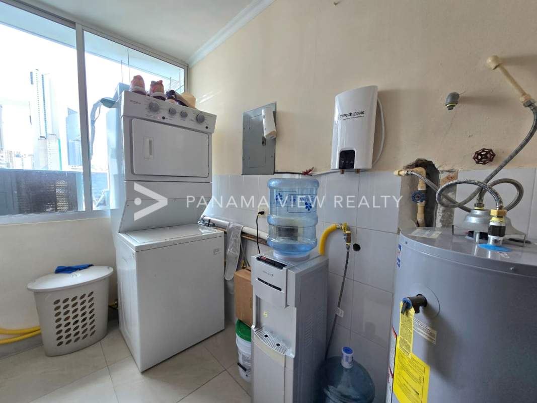 Bathroom with granite countertop, vessel sink, glass-enclosed shower PH Pacific Sun Panama City