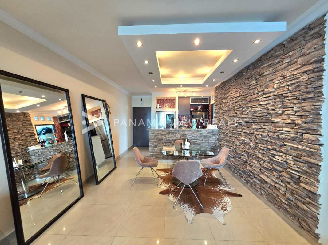 Laundry room with washer, water heater, large window city skyline in PH Pacific Sun Punta Pacífica