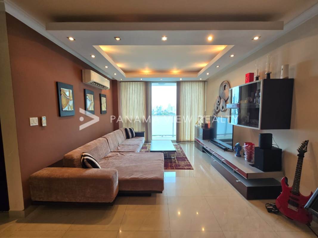 Modern open-plan living dining space with marble floors in PH Pacific Sun Punta Pacífica Panama