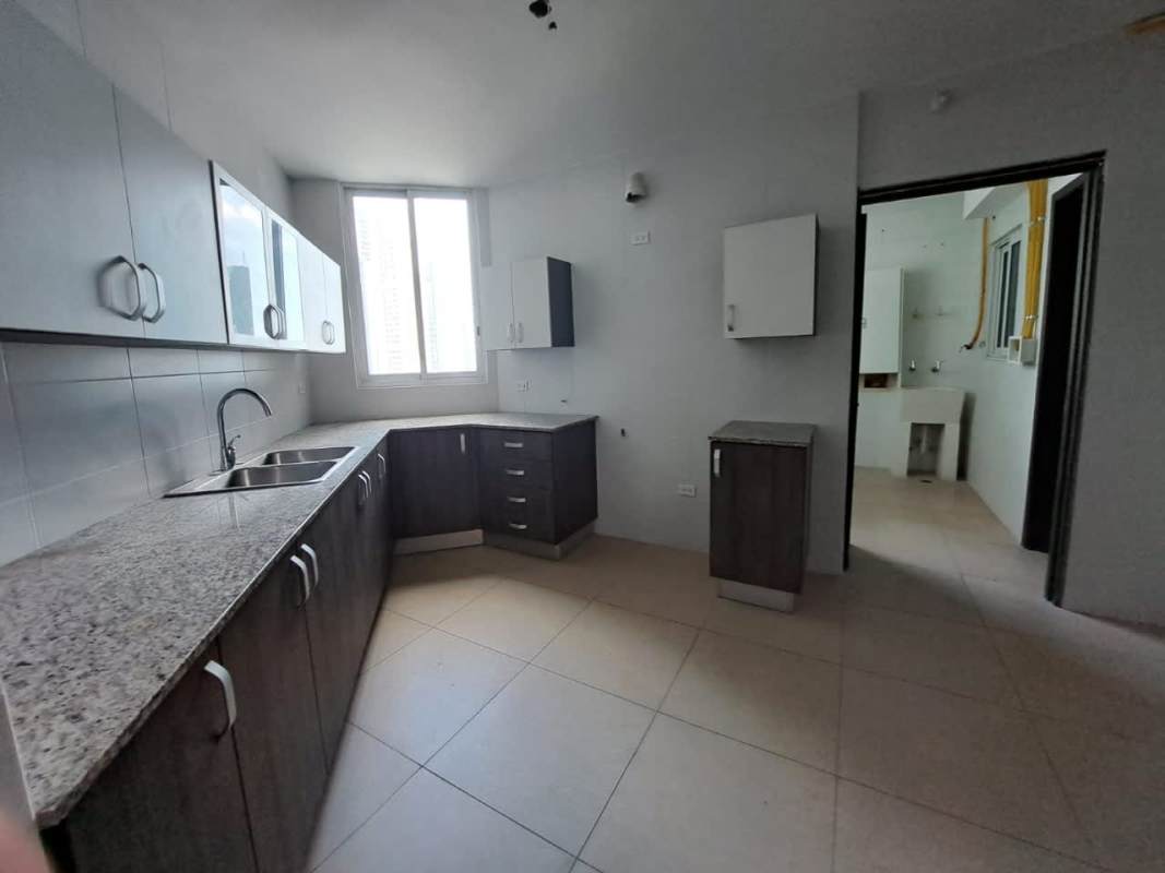 Modern kitchen with granite countertops, ample cabinetry and natural light PH Country Club Costa del Este Panama