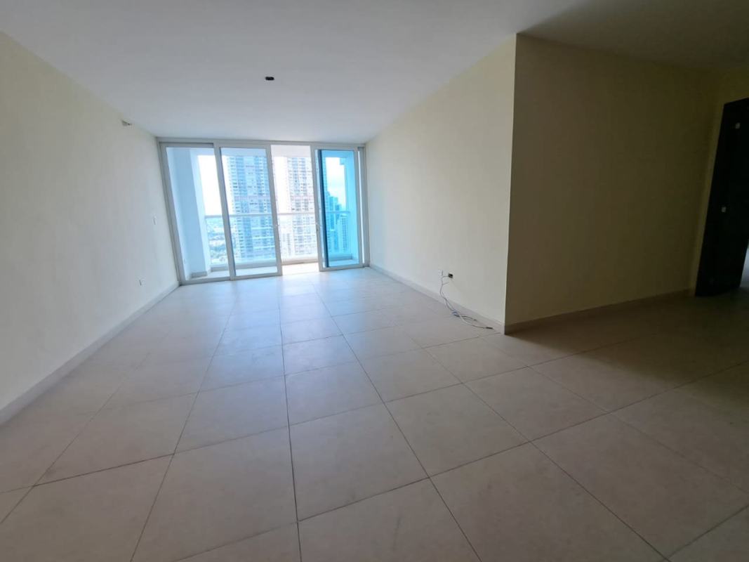 Large open-plan living room with balcony access in PH Country Club Costa del Este Panama City