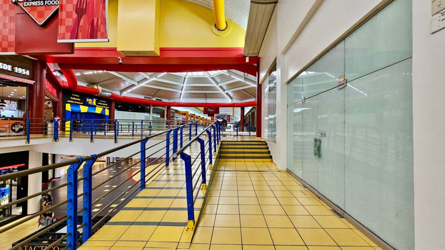 Interior finished retail unit with glass partitions inside Albrook Mall Panama