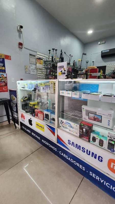 Retail interior with illuminated display cases and accessories inside Belisario Porras Plaza Panama