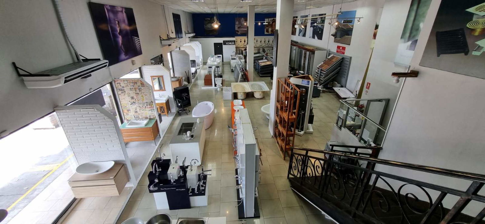 Retail showroom interior displaying bathroom fixtures with large windows Santa Elena Casco Viejo Panama