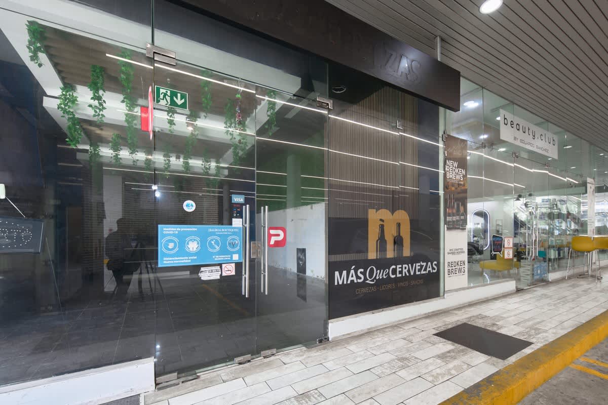 Retail storefront with glass facade and signage Balboa Boutiques Plaza Panama
