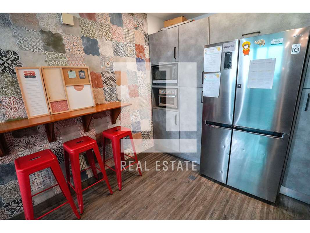 Private rooftop penthouse terrace with skyline views and synthetic grass at PH Trinity Tower Panama City