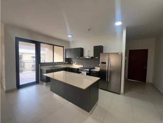 Open living and dining area with ceramic floors in PH River Valley Panama Pacifico
