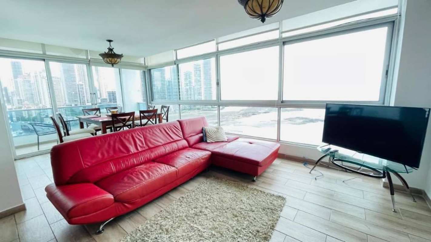 Modern dining space with large windows and ocean view in PH Bayfront Avenida Balboa Panama