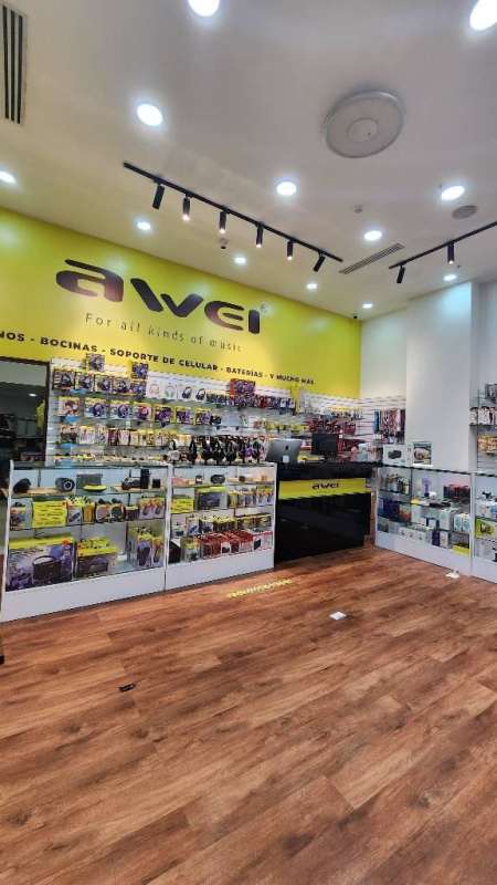 Electronics retail shop yellow wall glass counter Los Andes Mall Panama City Panama