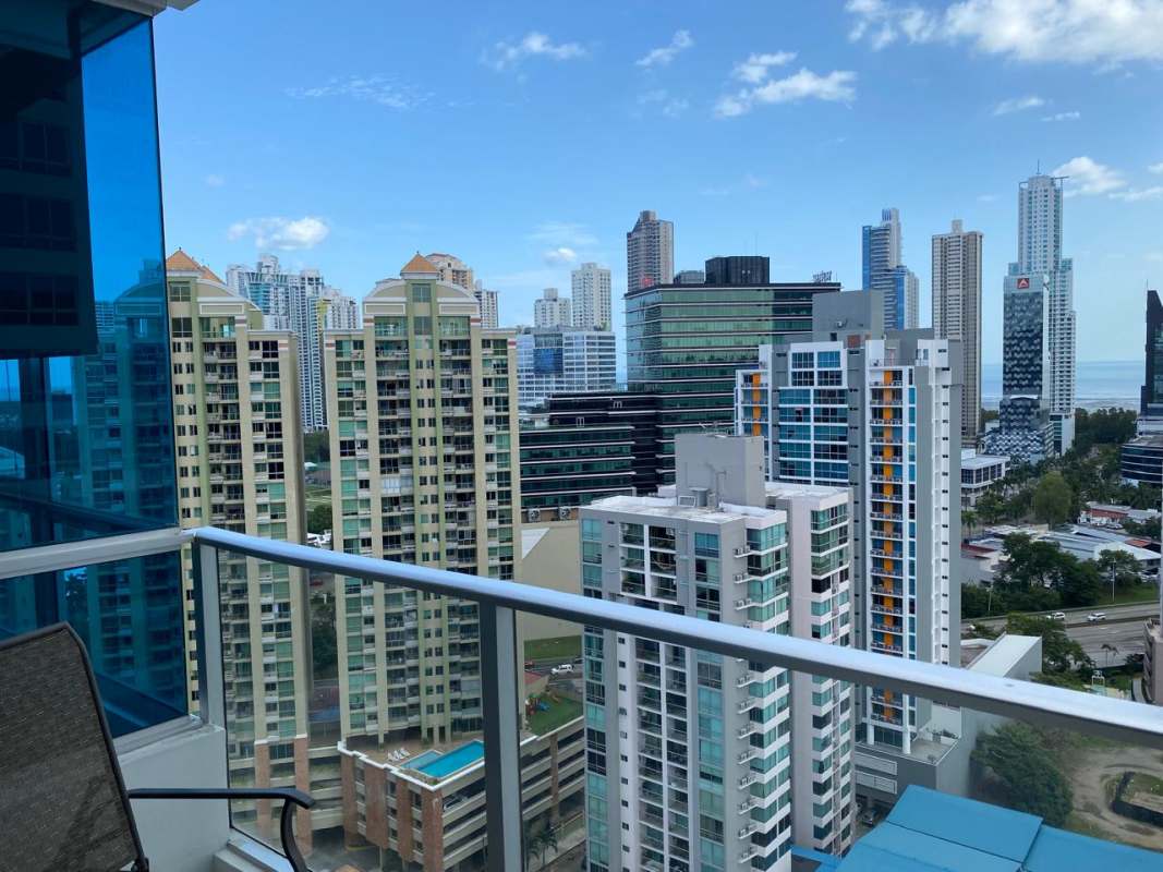 Panoramic balcony view of Costa del Este skyline and ocean from PH Top Tower Panama