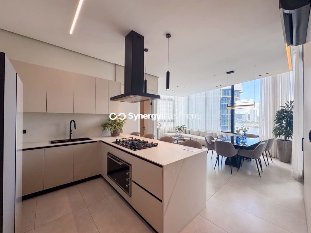 Spacious master bedroom with walk-in closet and Pacific ocean views at Sky Point Tower Panama City