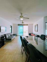 Balcony with lounge chairs overlooking pool and ocean Playa Blanca Resort Panama