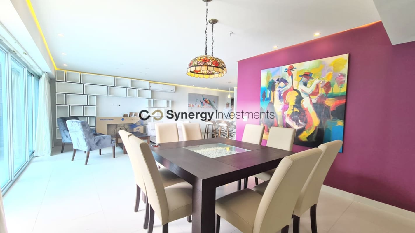 Rooftop infinity pool with panoramic ocean and city views at PH Costa del Este Panama