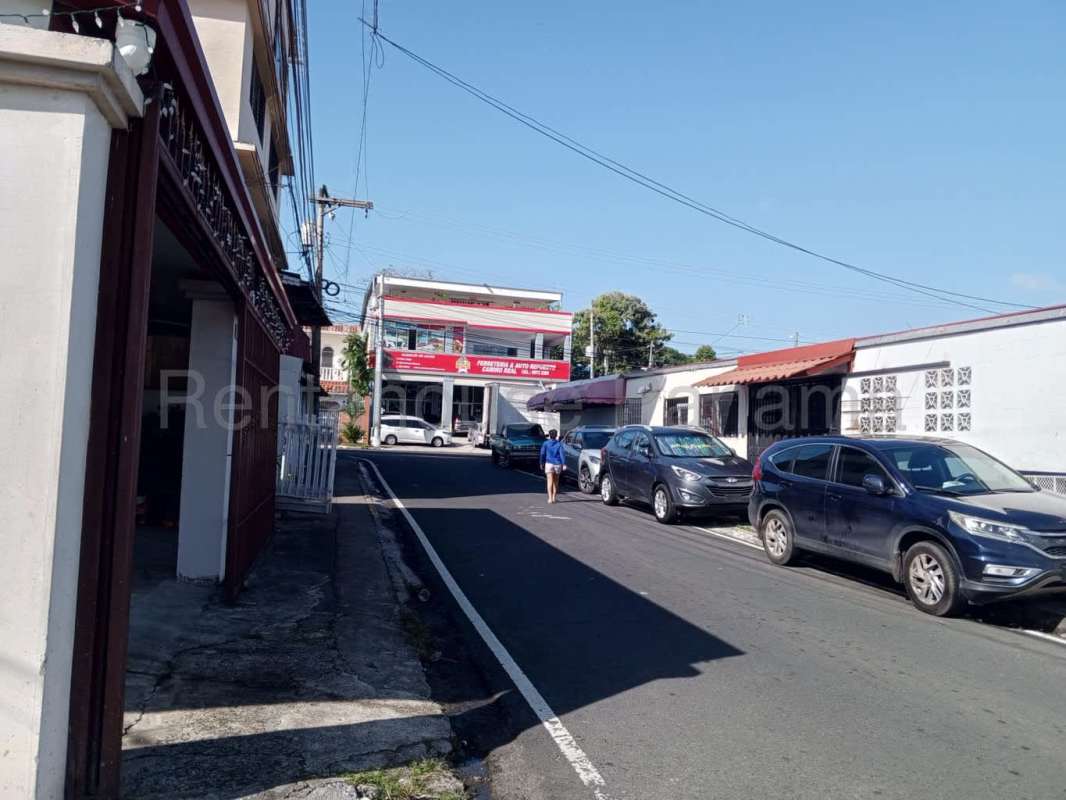Traditional bathroom with walk-in shower, pedestal sink, ceramic walls in Betania home for sale