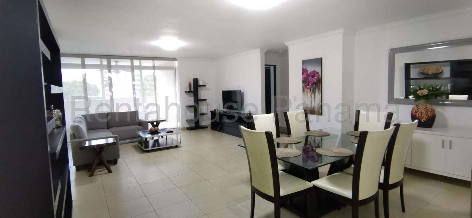 Furnished main bedroom with large window, split AC, ceiling fan in PH Blue Park, Bella Vista Panama