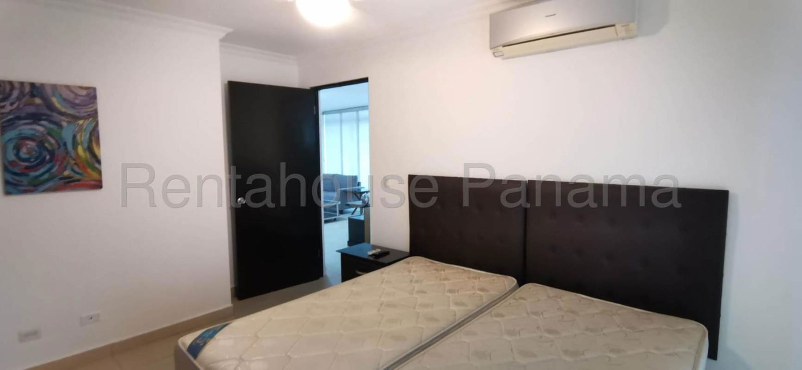 Outdoor swimming pool with sun deck and lounge chairs in PH Blue Park Bella Vista Panama