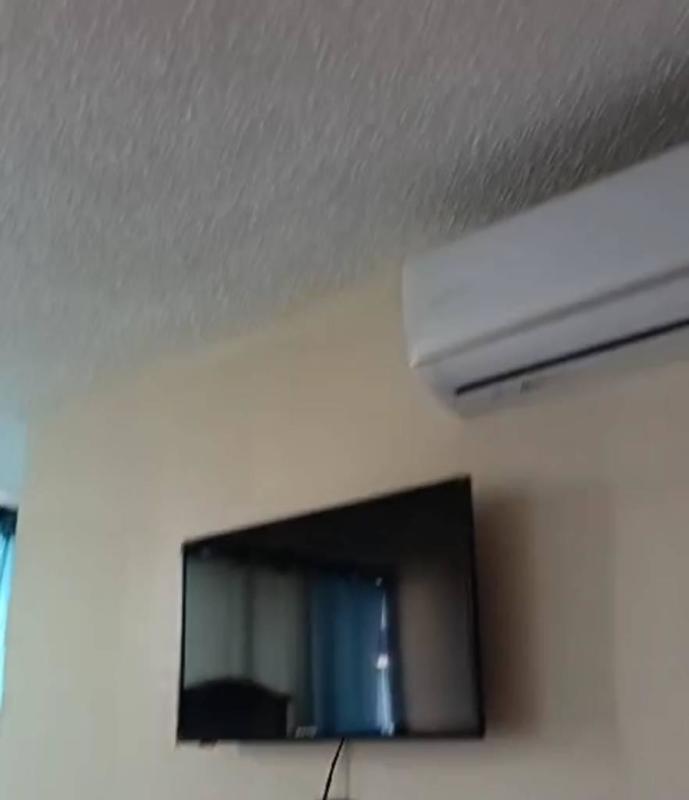 Compact kitchen with granite countertop, refrigerator PH EL Cangrejo Tower Panama