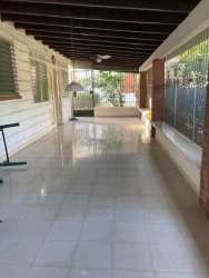 Traditional kitchen with wood cabinets and appliances Bouganvillas Villa Coronado Panama