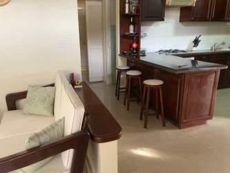 Casual dining area connected to living space in villa Coronado Bouganvillas Panama