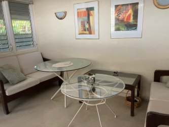 Enclosed patio sunroom with large windows in Villa Coronado Bouganvillas Panama