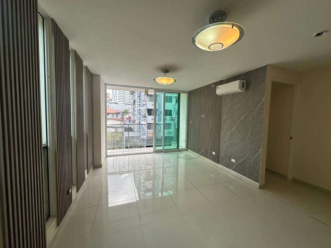 Open plan living dining area with large windows, split AC and granite kitchen PH Bela Vita Panama City