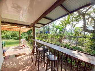 Bedroom with large window, tiled floor, and outdoor views Boquete
