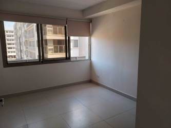 Spacious bedroom with large built-in wardrobe in Woodlands MIDRISE Panama Pacifico