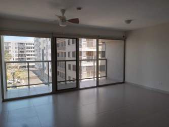 Spacious modern living room with balcony access and floor-to-ceiling windows in MIDRISE Woodlands Panama