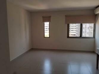 Open plan living and dining with balcony at MIDRISE Woodlands Panama Pacifico