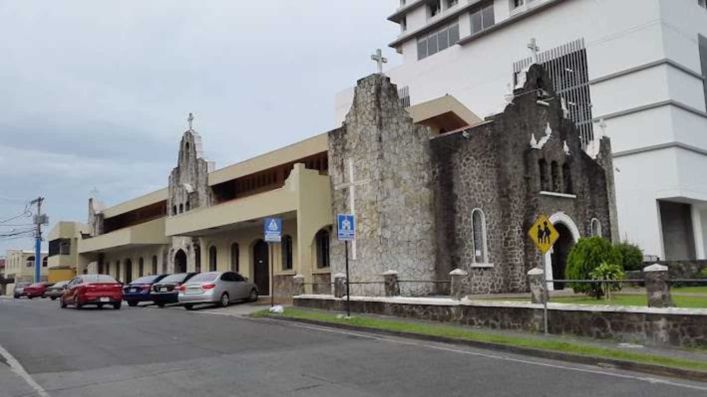 Facade of commercial house with gates on main commercial street in Parque Lefevre Panama City