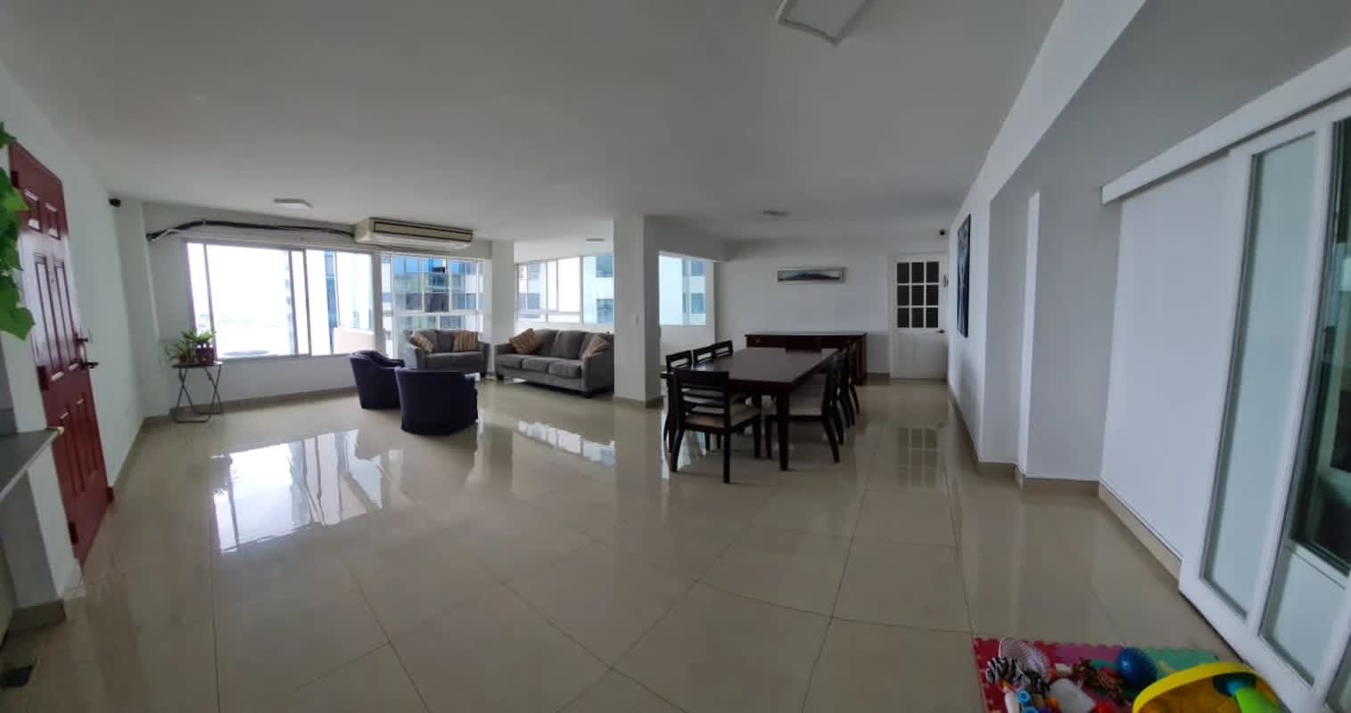 Spacious bright living dining room with tile floors at PH Las Perlas Punta Paitilla