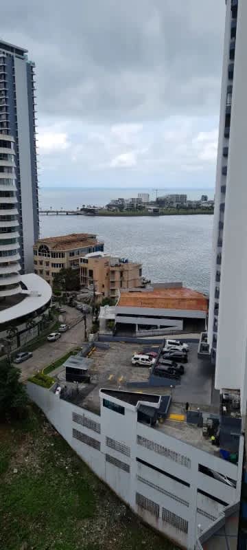 High-rise apartment balcony overlooking Punta Paitilla skyline and ocean