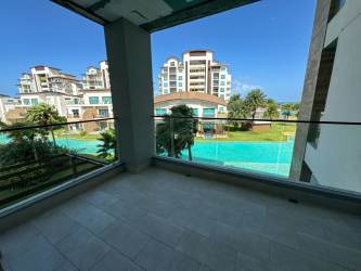 Covered terrace with pool and lush garden views Playa Escondida resort Caribbean Panama