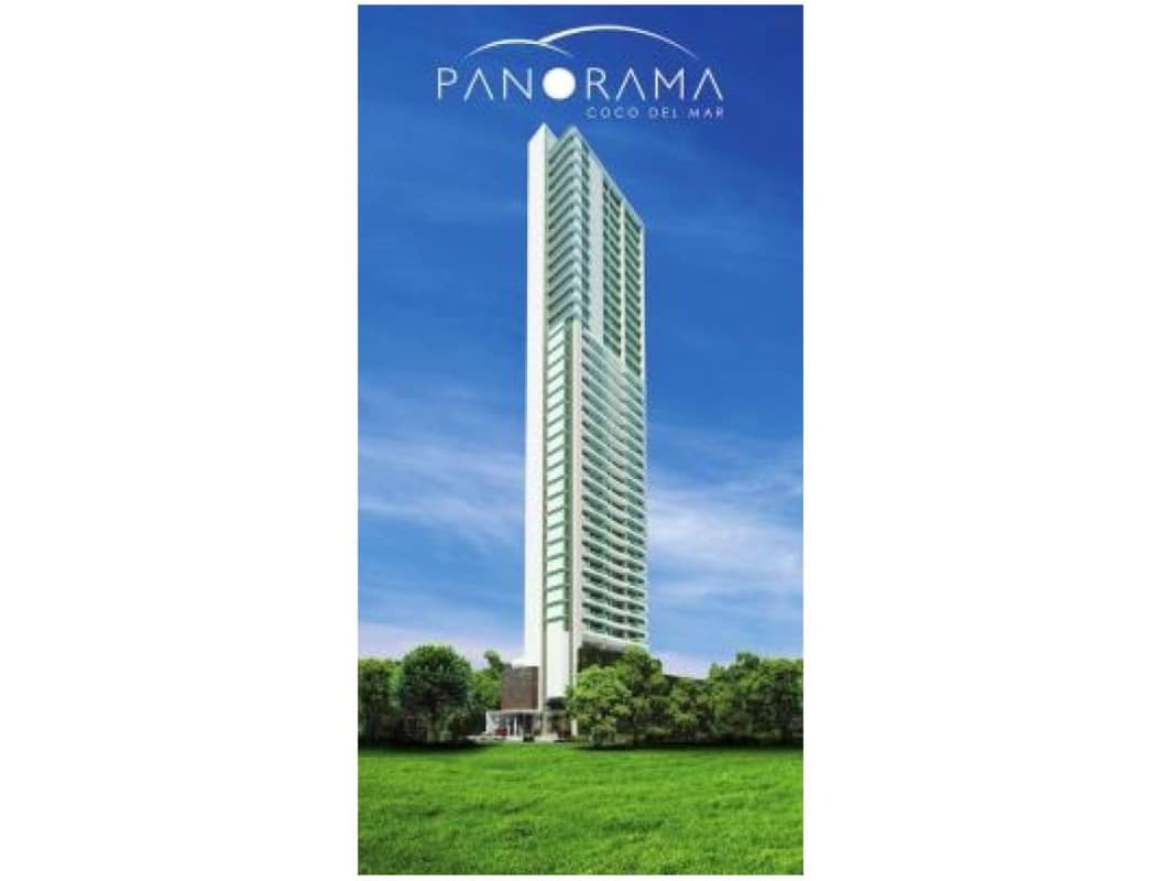 Tall modern condo tower PH Panorama Coco del Mar surrounded by greenery Panama City