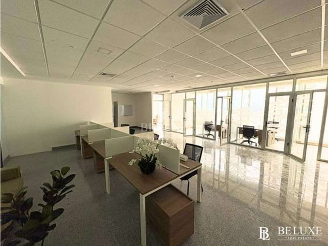 Furnished conference room floor-to-ceiling windows ocean skyline views BICSA Tower Panama