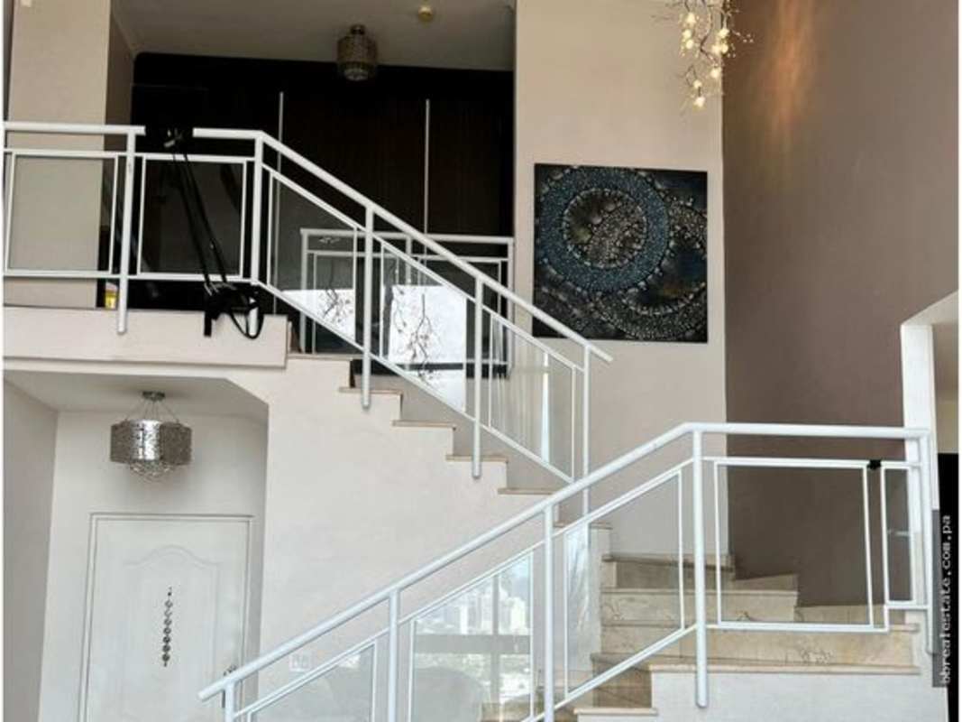 Modern bathroom with glass shower, granite counter, stylish fixtures in PH Costa Pacifica penthouse Panama City