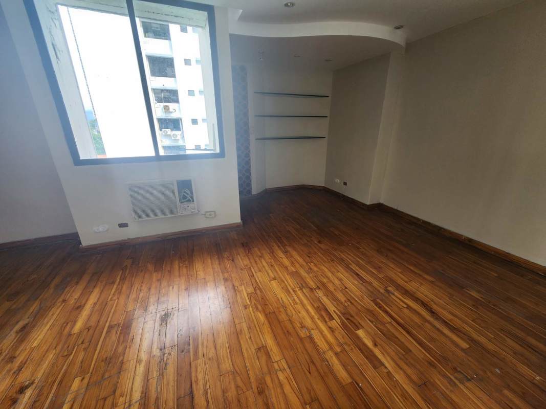 Spacious open living dining with floor-to-ceiling windows, balcony, curved glass wall PH La Caleta Coco del Mar