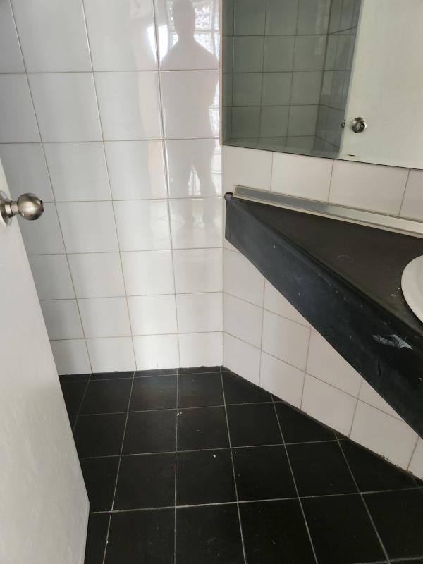 Bedroom with large windows, built-in white closets, city view PH La Caleta Penthouse Panama City