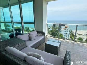 Private balcony with glass railing offering unobstructed Pacific Ocean views at Rio Mar Beachfront