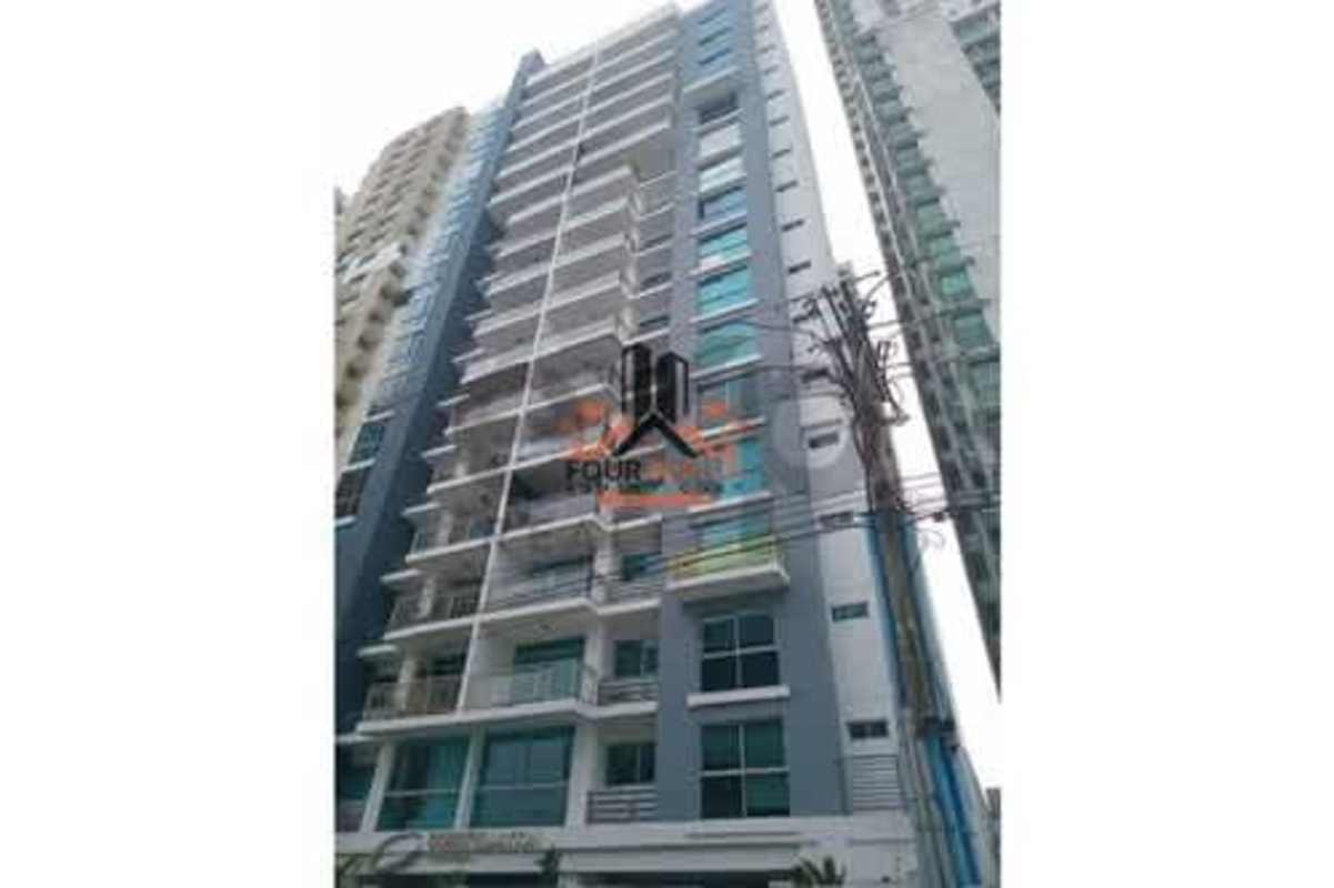 Modern high-rise exterior of PH Constellation tower in Dos Mares Panama