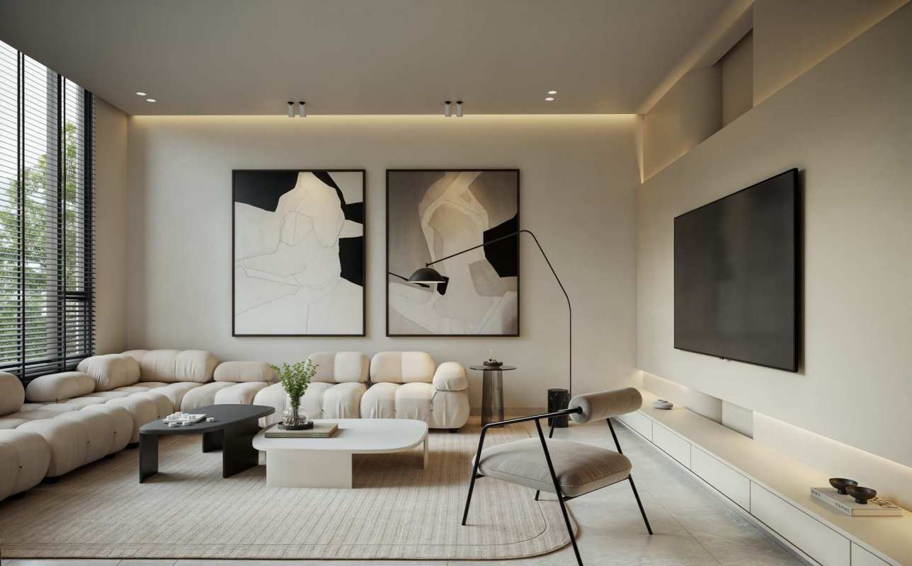 Bright minimalist living area with sectional sofa wood flooring at Blau Residence Panama
