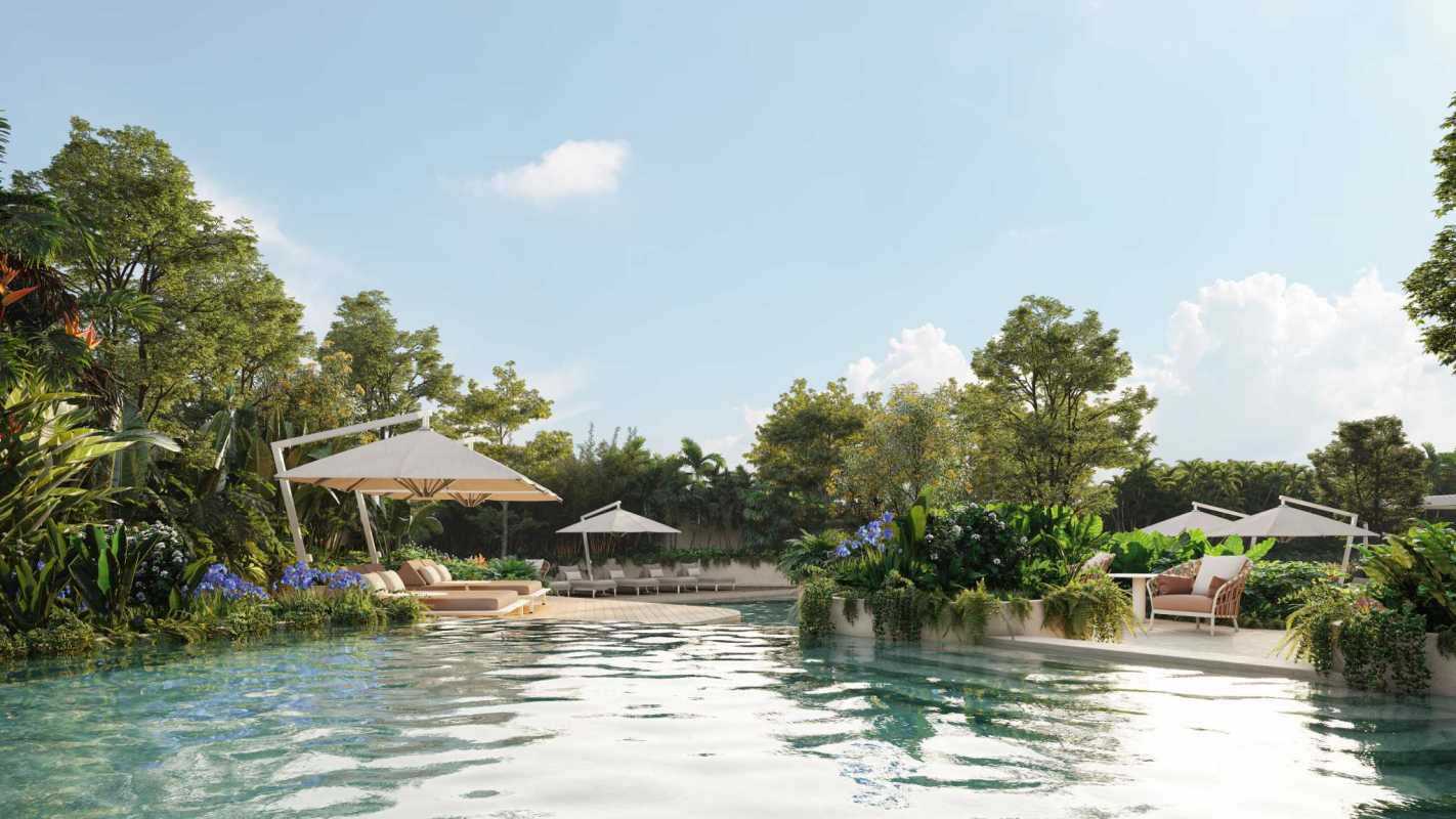Bright lounge with open kitchen island double height windows and garden views at Blau Residence Panama