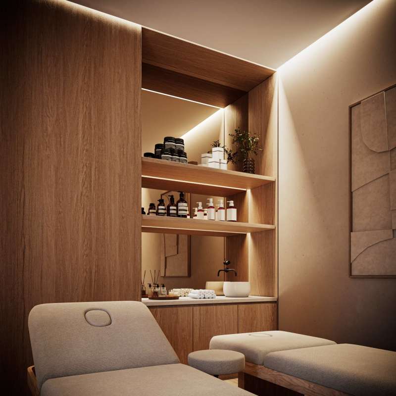 Modern spa treatment room with wooden shelving and relaxing decor at Blau Residence