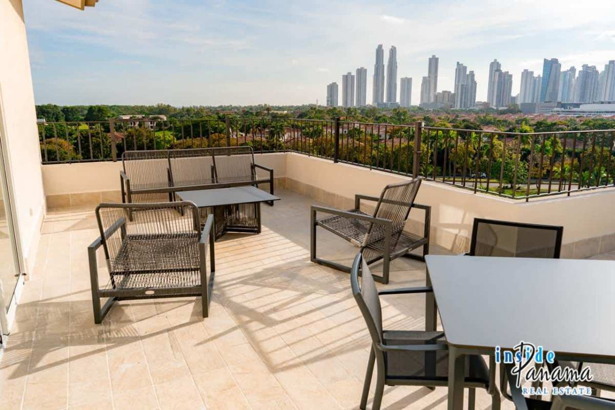 Modern penthouse bathroom with marble counters and double sinks at The Reserve Santa Maria Panama