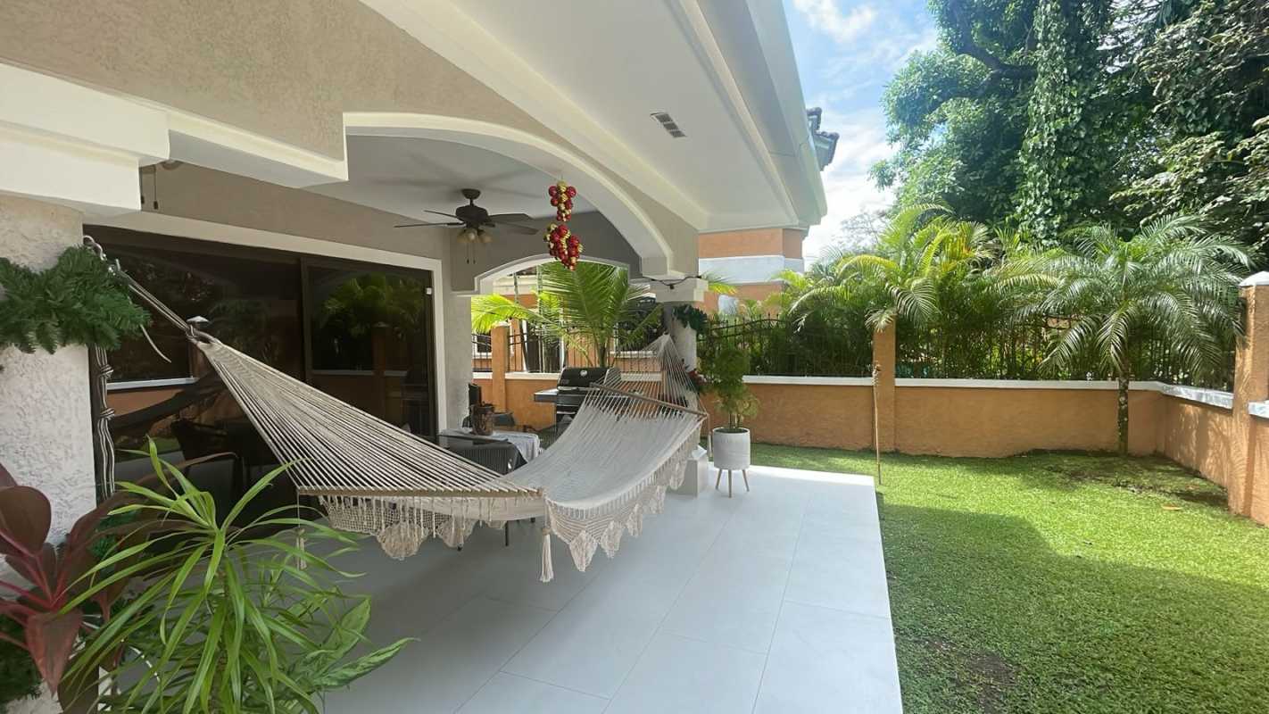 Spacious bedroom with tile floor, ceiling fan and AC Clayton Village house rental