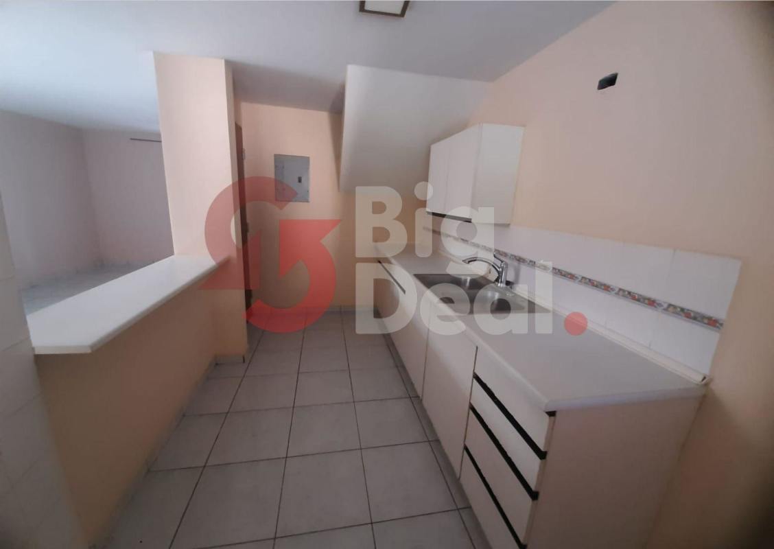 Minimalist kitchen with white cabinets tile backsplash Condado del Rey Panama