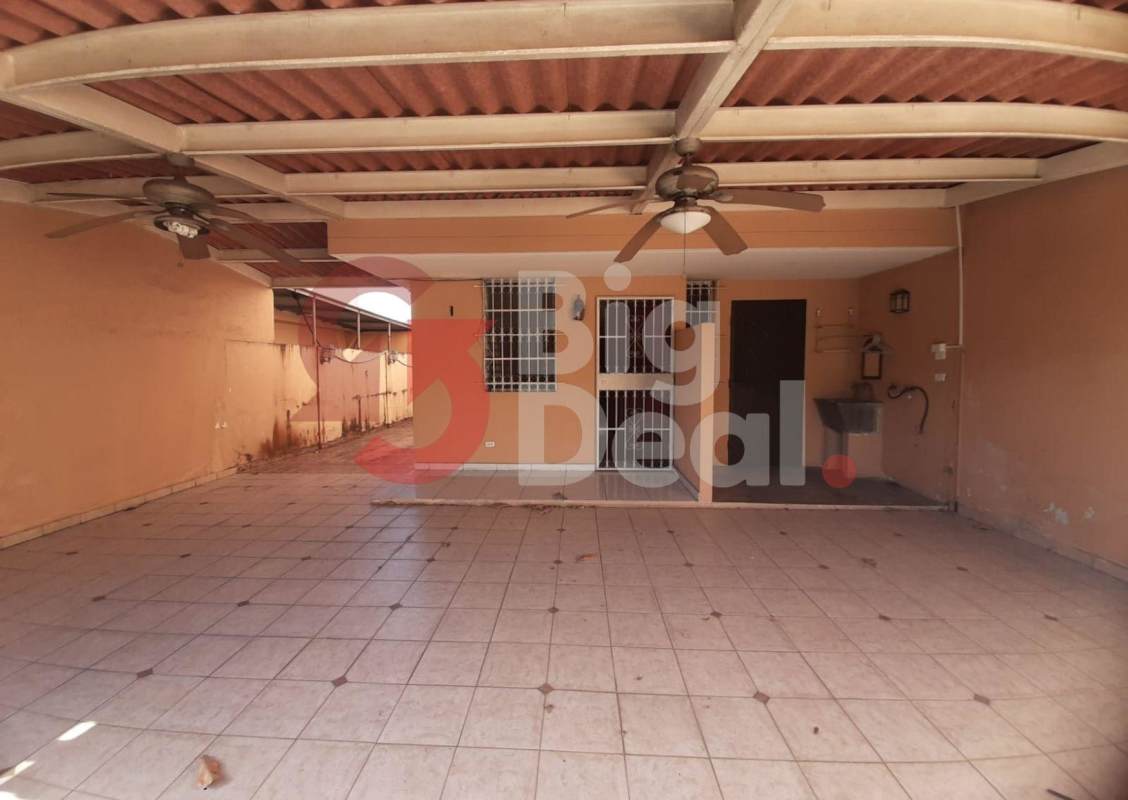 Large living area with staircase tile floors chandelier Condado del Rey Panama City