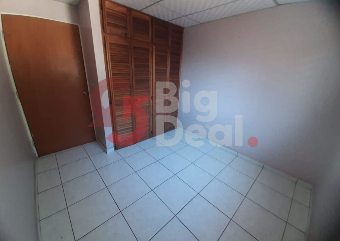 Bedroom with built-in closet white tiled floor Condado del Rey Panama